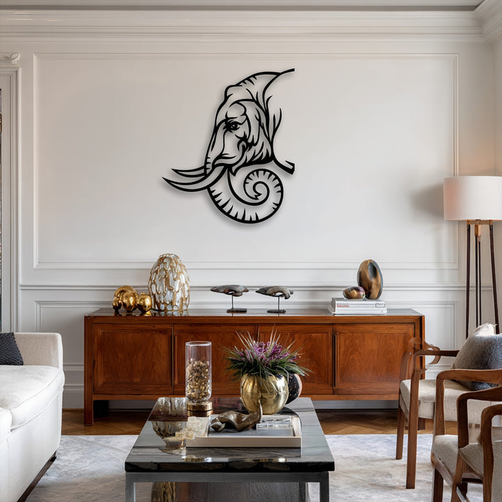 The negative space of the elephant line art metal wall decor highlights its tribal design against a light wall, creating a striking contrast.