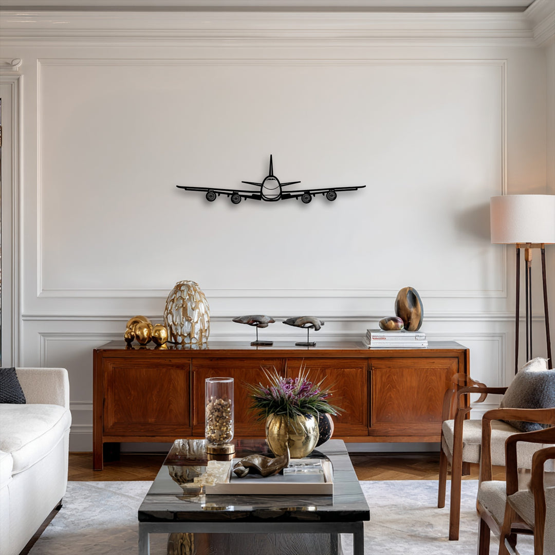 The abstract quality of this unique metal wall art presents an airplane's sleek front view, a minimalist aviation decor.
