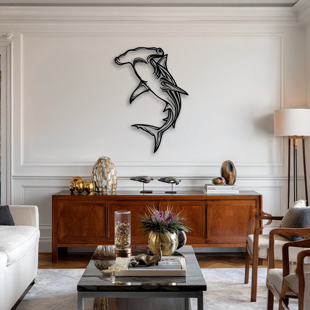 Angular lines and sleek curves define the hammerhead shark decorative metal art, complementing the room's geometric wall panels and rectangular furnishings.