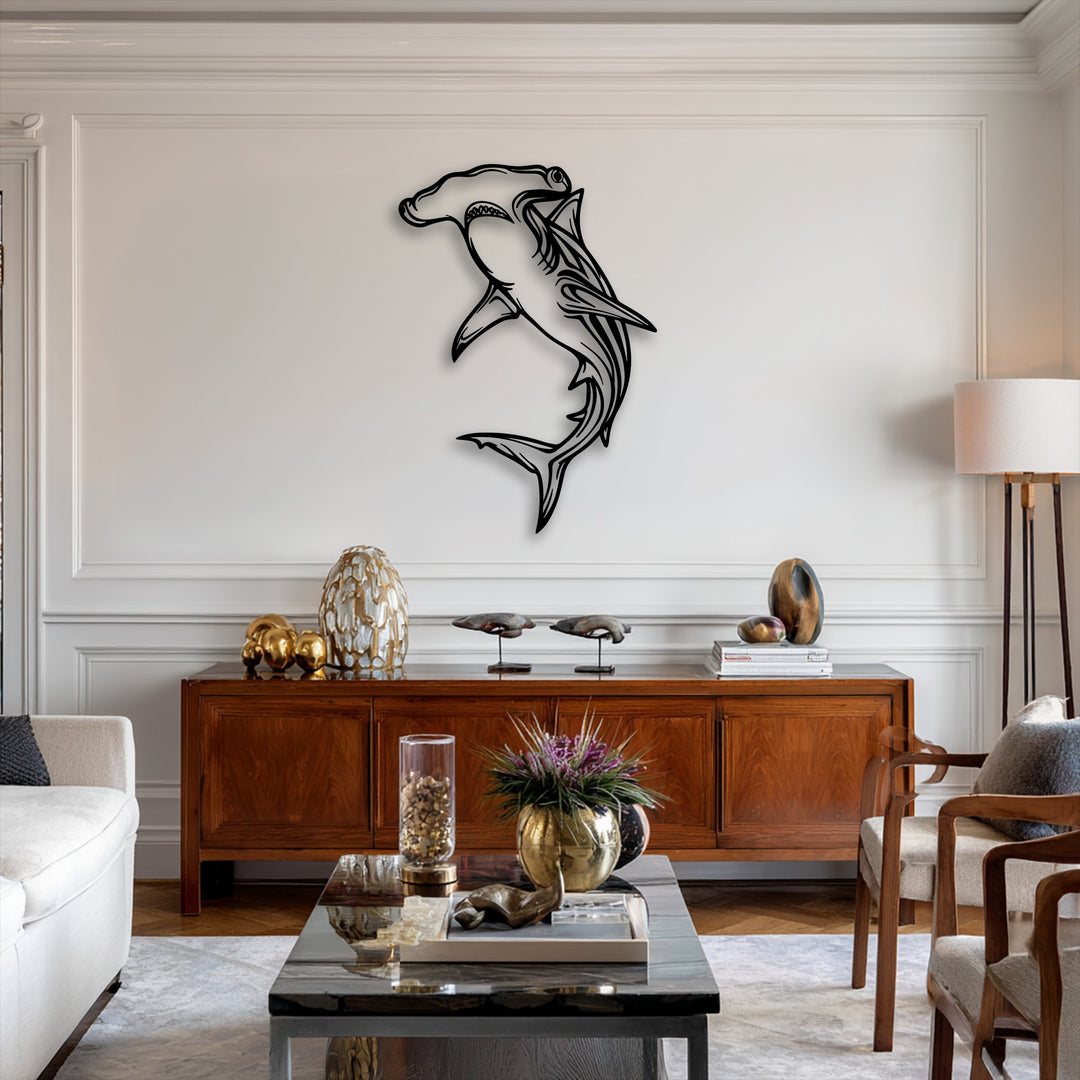 Angular lines and sleek curves define the hammerhead shark decorative metal art, complementing the room's geometric wall panels and rectangular furnishings.