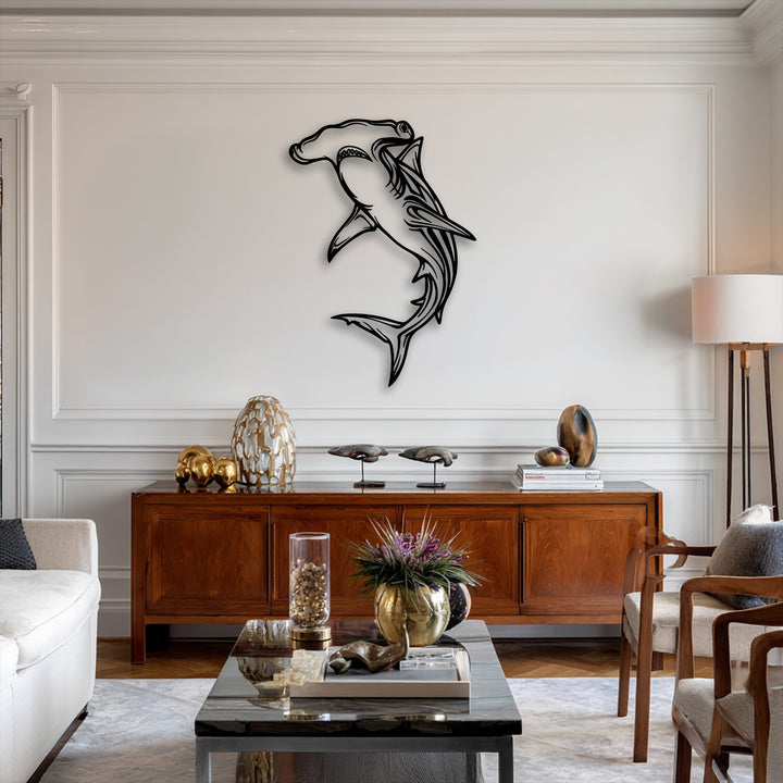 Angular lines and sleek curves define the hammerhead shark decorative metal art, complementing the room's geometric wall panels and rectangular furnishings.