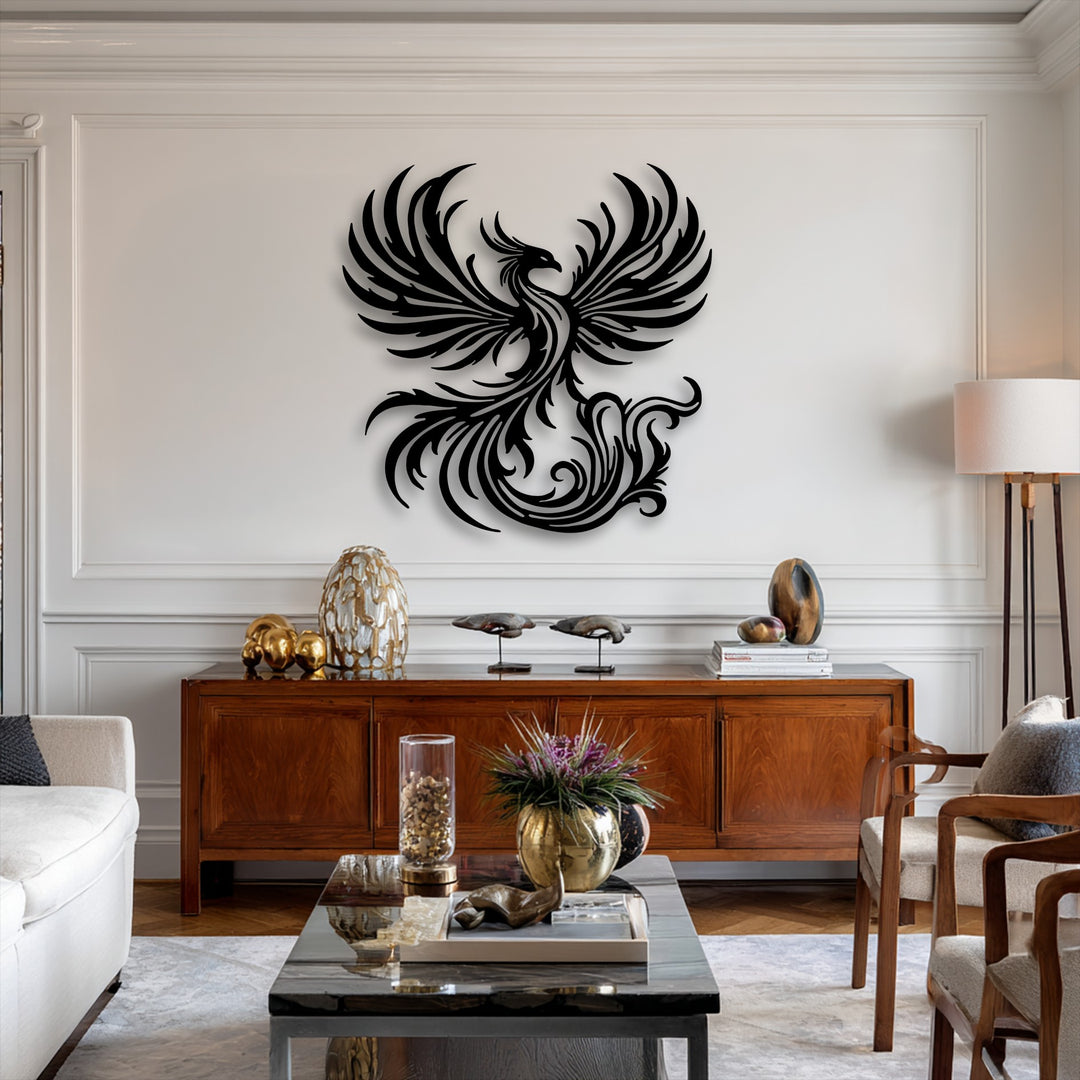 Organic forms of a mythical phoenix rise in this intricate decorative metal art, featuring bold, flowing wings and tail on a white wall.