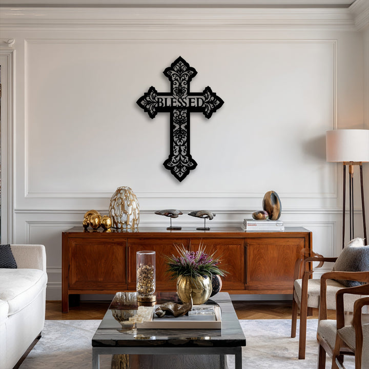 The ornate edges and decorative borders of the Blessed Cross metal art for wall feature intricate black scrollwork against a white background.