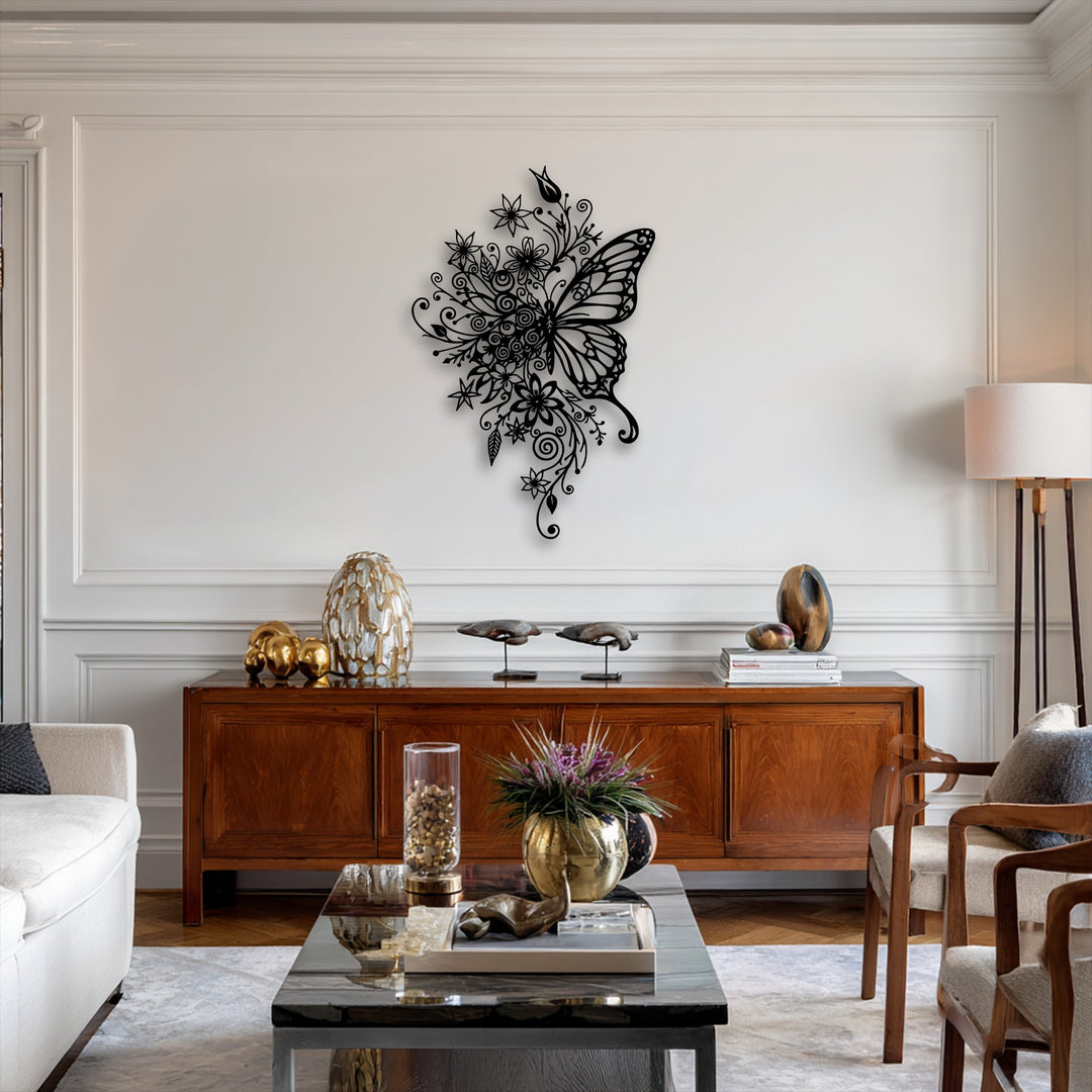 The realistic detail reveals the intricate design of the black butterfly and sprawling floral motifs, creating striking decorative metal art.