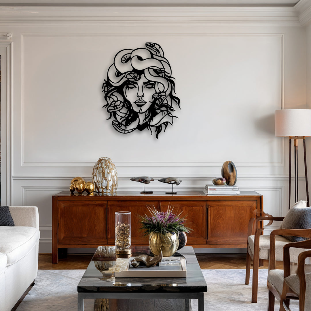 The stark white negative space expertly defines the captivating features of the Medusa metal wall decor, emphasizing its mythological snake goddess design.