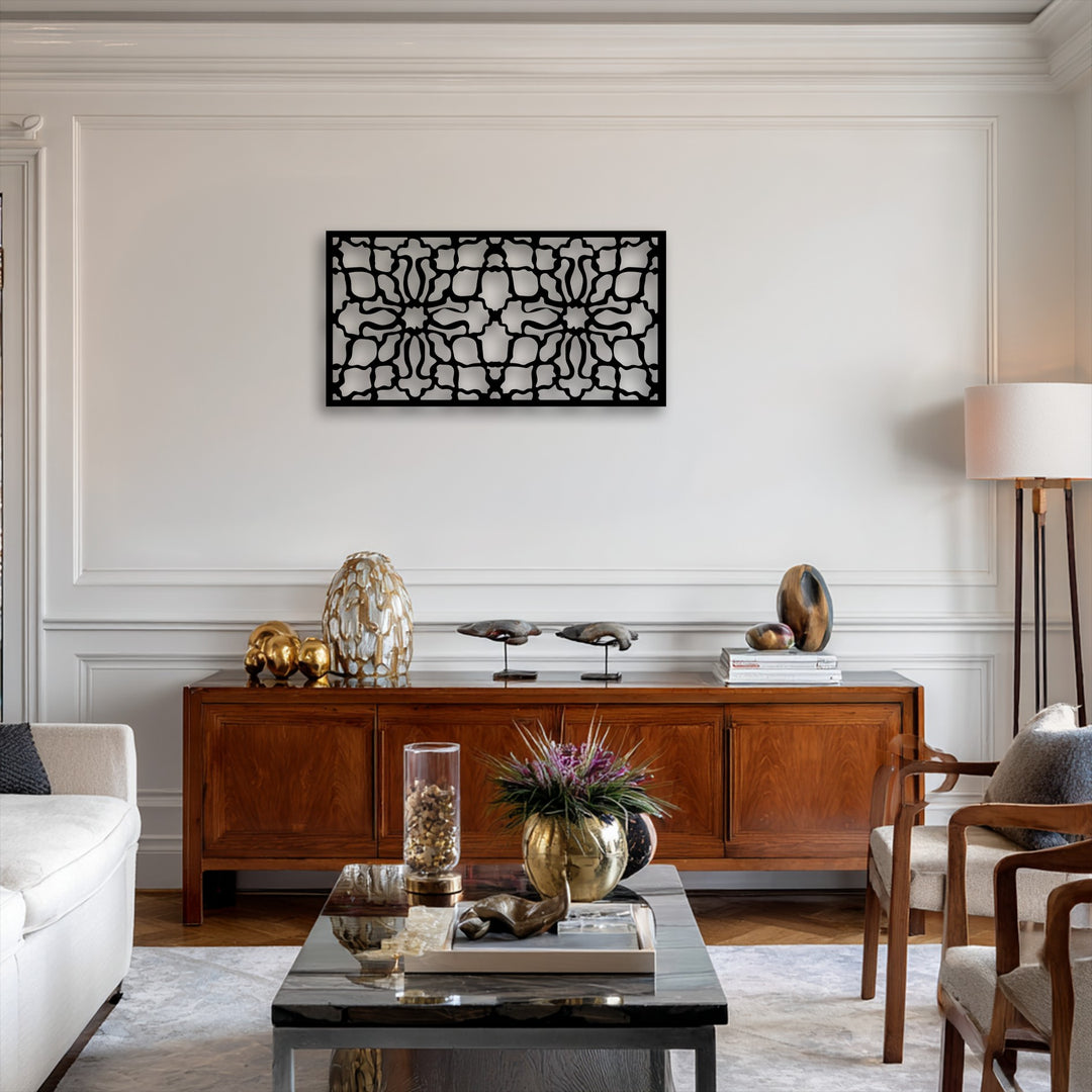 The abstract quality of the intricate black ornamental geometric pattern panel beautifully presents unique metal artwork.