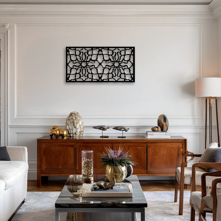 The abstract quality of the intricate black ornamental geometric pattern panel beautifully presents unique metal artwork.