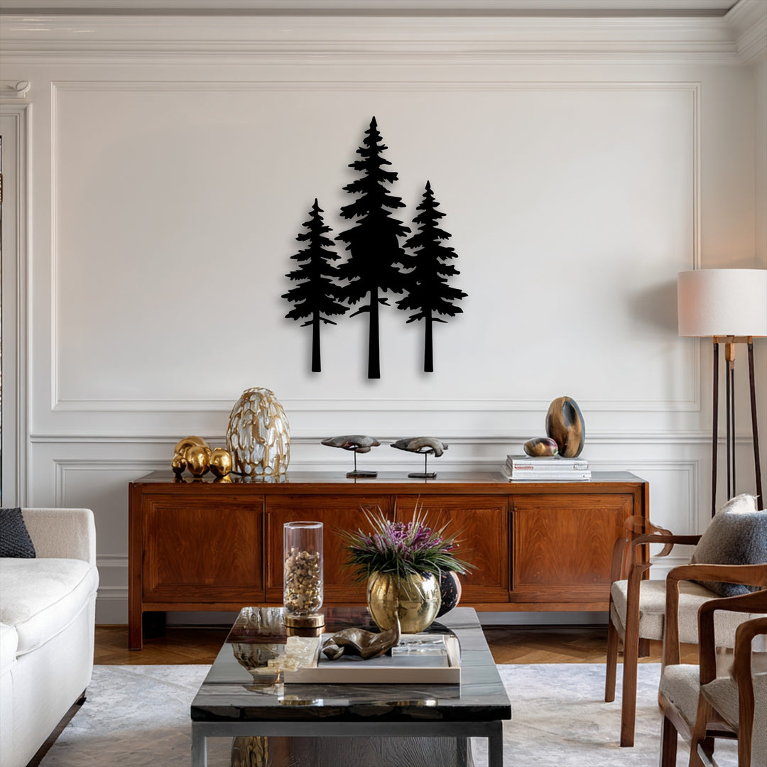 The realistic detail showcases a striking pine forest silhouette metal artwork with three distinct trees against a pristine white wall.