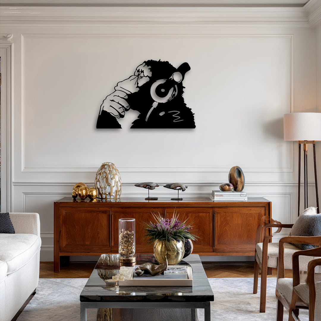 The brightest area, a pristine white wall, prominently displays a unique urban monkey headphones metal wall art, an excellent piece of decoration wall art.