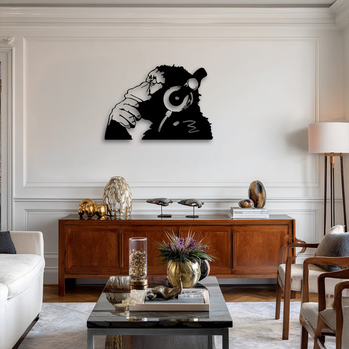 The brightest area, a pristine white wall, prominently displays a unique urban monkey headphones metal wall art, an excellent piece of decoration wall art.