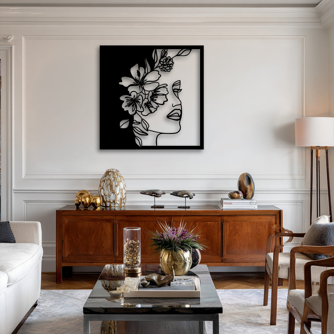 A striking transition from deep black to bright white highlights the delicate floral woman line art metal artwork.