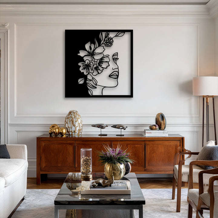 A striking transition from deep black to bright white highlights the delicate floral woman line art metal artwork.