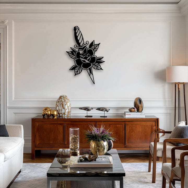 The dagger piercing the rose silhouette in the metal wall decor conveys a powerful, flowing sense of dynamic movement.