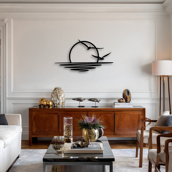 The background features a minimalist sunset and seagull decorative metal art piece against a pristine white paneled wall.