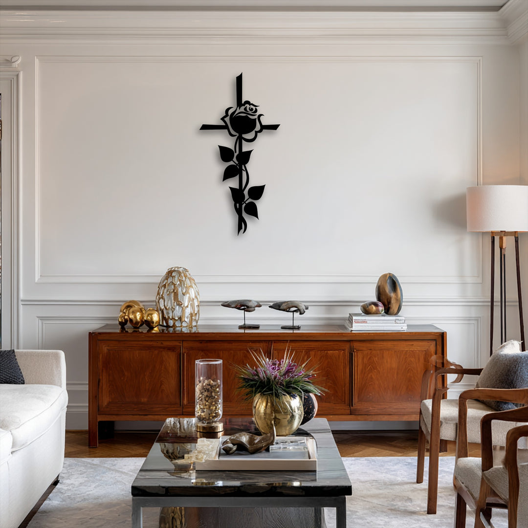 A dark coffee table displaying purple flowers and gold decor fills the foreground, complemented by a beautiful Rose Cross Silhouette metal artwork.