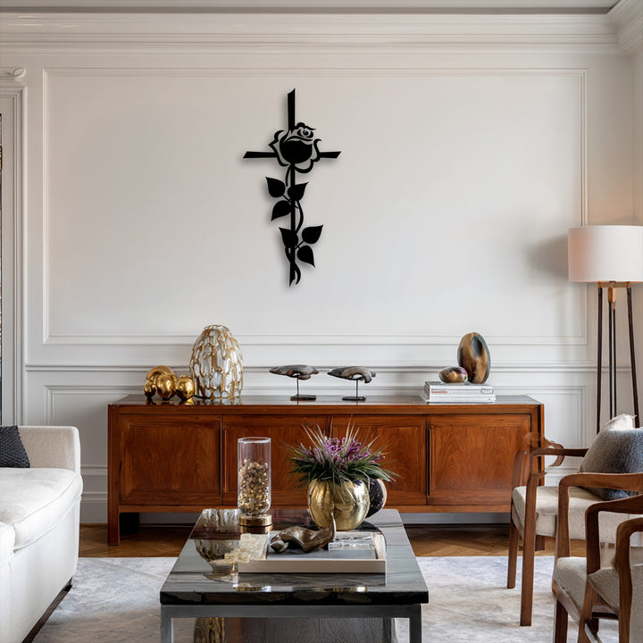 A dark coffee table displaying purple flowers and gold decor fills the foreground, complemented by a beautiful Rose Cross Silhouette metal artwork.