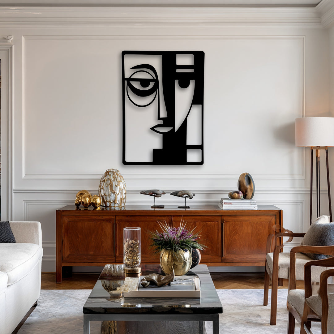 The smooth, matte black finish of the abstract dual face modern geometric metal artwork stands out against the white wall.