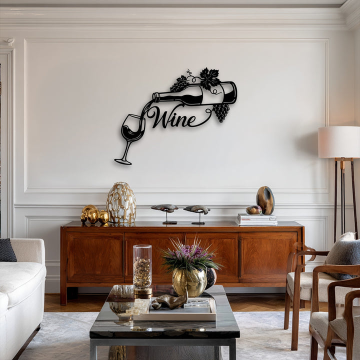 The organic forms of the decorative metal art showcase an elegant wine bottle pouring into a glass, adorned with natural grapevines.