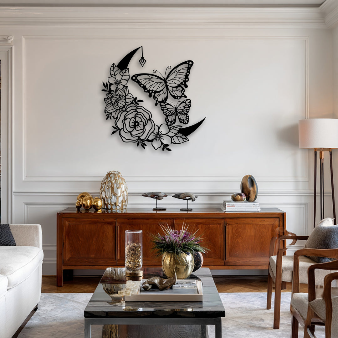 The crescent moon shape of the intricate butterfly and floral metal wall decor adds a mystical geometric touch.