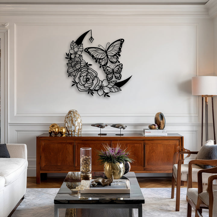 The crescent moon shape of the intricate butterfly and floral metal wall decor adds a mystical geometric touch.