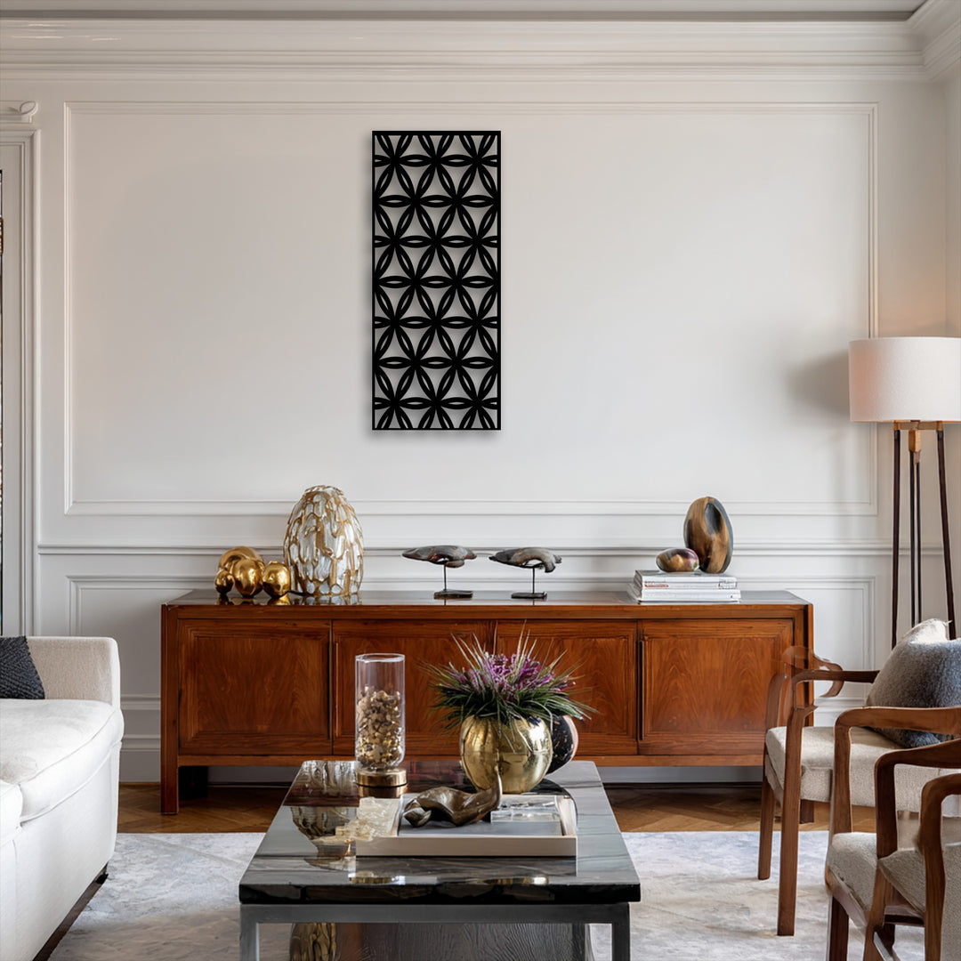 The compelling transition of colors is evident in the bold black geometric floral grid decorative metal art against the pure white wall backdrop.