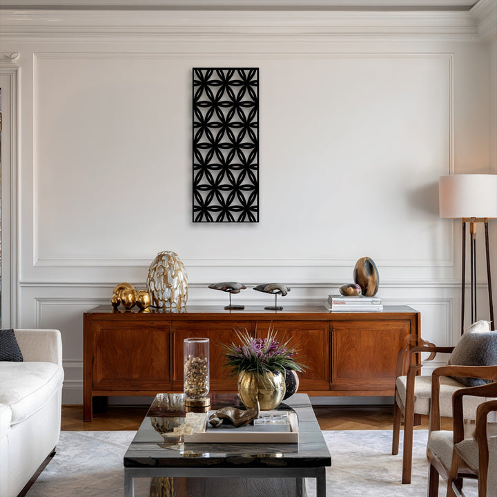 The compelling transition of colors is evident in the bold black geometric floral grid decorative metal art against the pure white wall backdrop.