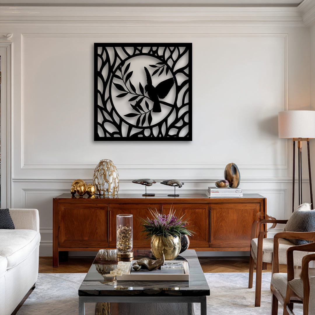 The darkest area prominently displays the sleek black graceful bird in nature circle decorative metal art, a striking silhouette.