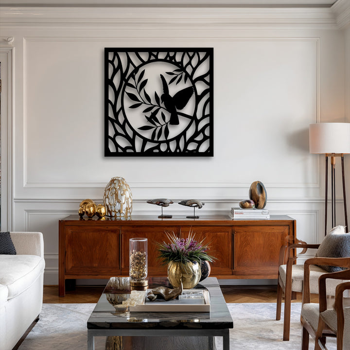 The darkest area prominently displays the sleek black graceful bird in nature circle decorative metal art, a striking silhouette.