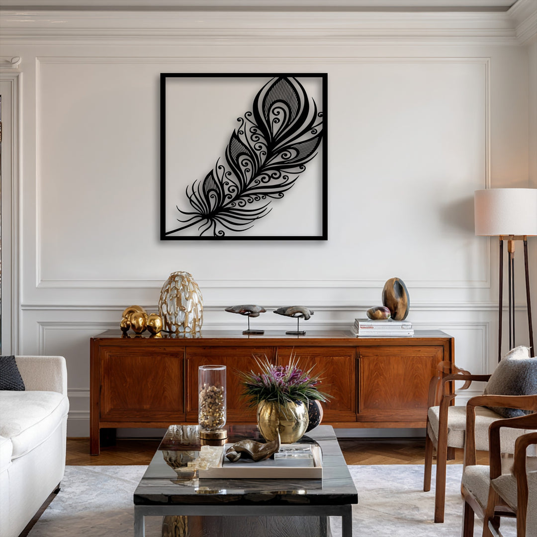 A warm color temperature illuminates elegant metal artwork, an ornate feather design centered above a wood console with gold accents.