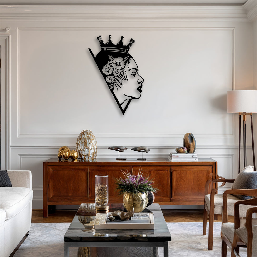 Against a dominant creamy white wall, a striking black Floral Queen Silhouette metal wall decor piece elegantly accents the modern interior.