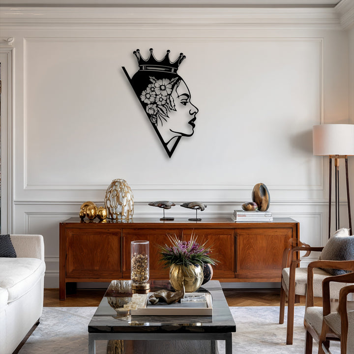 Against a dominant creamy white wall, a striking black Floral Queen Silhouette metal wall decor piece elegantly accents the modern interior.