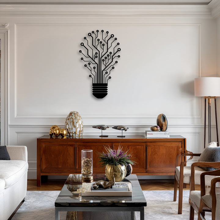 The organic, flowing lines of the tech tree lightbulb metal wall decor beautifully complement the natural shapes of the display pieces on the credenza.