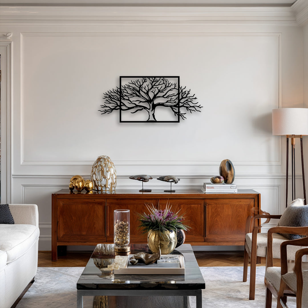 Soft off-white sofa cushions and a plush light-toned rug enhance the striking framed tree metal artwork, showcasing its abstract nature design.