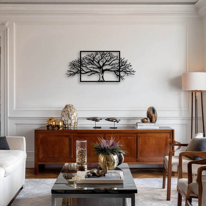 Soft off-white sofa cushions and a plush light-toned rug enhance the striking framed tree metal artwork, showcasing its abstract nature design.