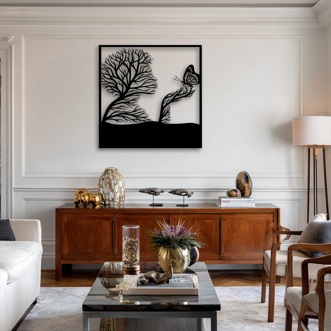 Visual rhythm is artfully conveyed through the graceful branches of the tree and butterfly silhouette in this striking metal wall decor.