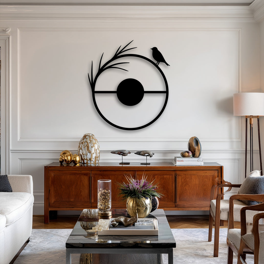 The invitingly warm color temperature of the room complements the striking minimal bird circle metal artwork, creating a cozy ambiance.