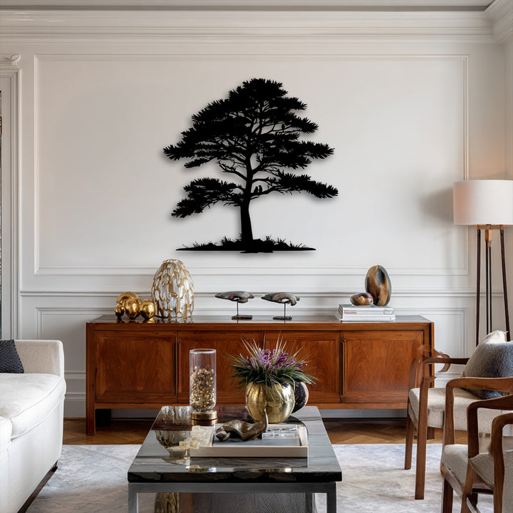 The darkest area showcases a bold tree silhouette decorative metal art piece, depicting intricate pine nature branches on a bright wall.