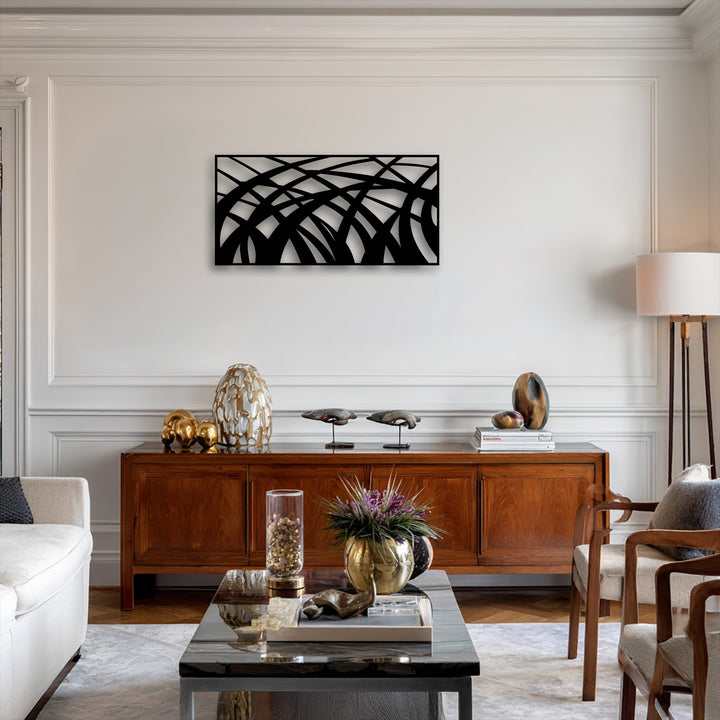 The dynamic geometric elements feature bold, curving, and interlacing lines forming unique metal wall art that creates a modern abstract design.
