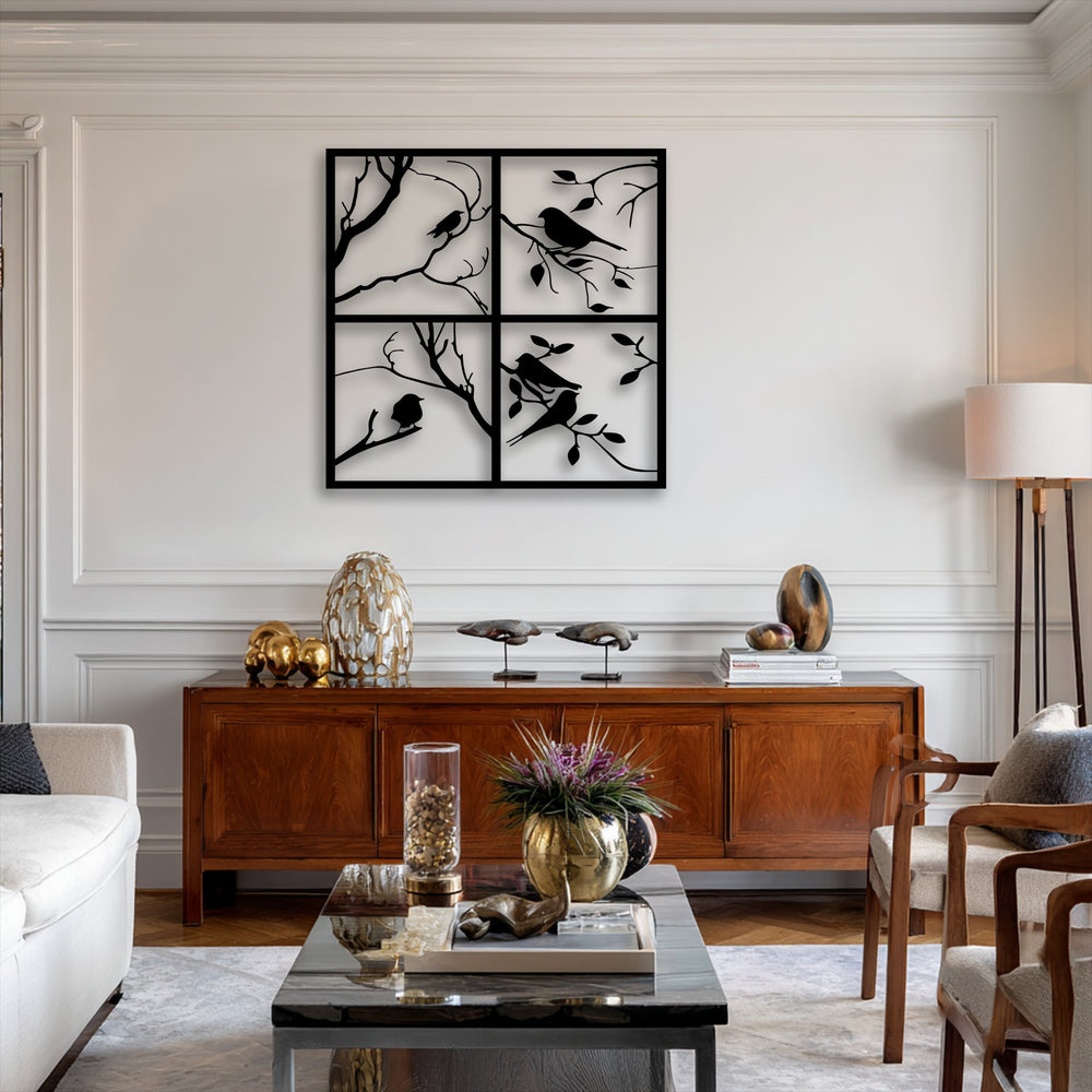 The striking color contrast of the black four panel bird silhouette metal wall decor against the light wall creates a sophisticated focal point.