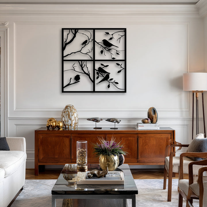 The striking color contrast of the black four panel bird silhouette metal wall decor against the light wall creates a sophisticated focal point.