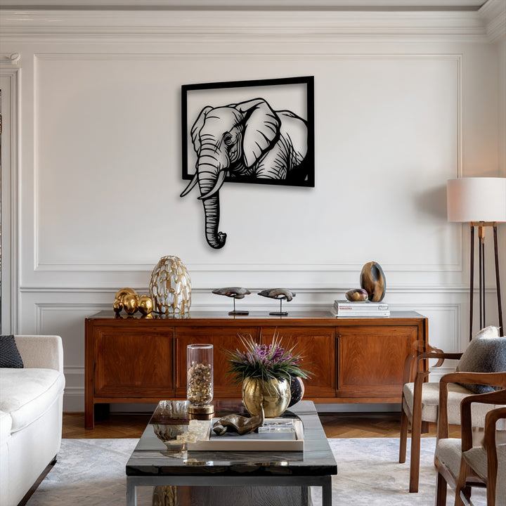 The smooth, matte black surface texture of the Emerging Elephant Frame metal art for wall creates a crisp, striking 3D effect.