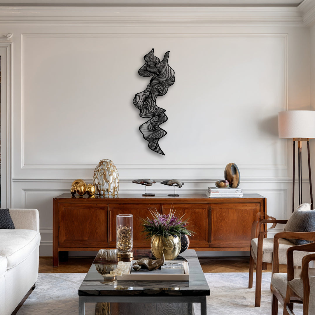 Light and shadow intricately play across the vertical abstract flow metal wall decor, highlighting its modern line sculpture.