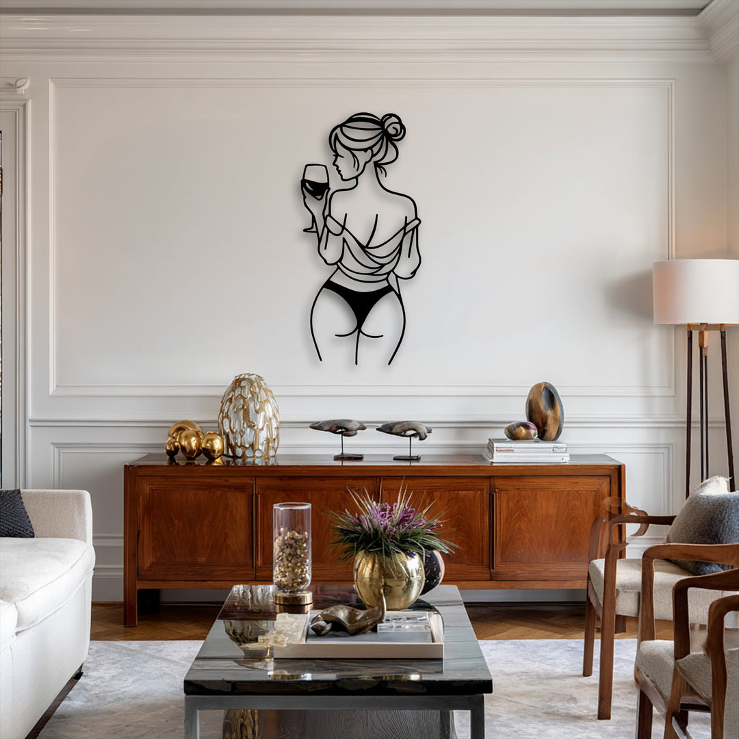The pristine white wall perfectly highlights the elegant wine moment minimal line art decorative metal art.