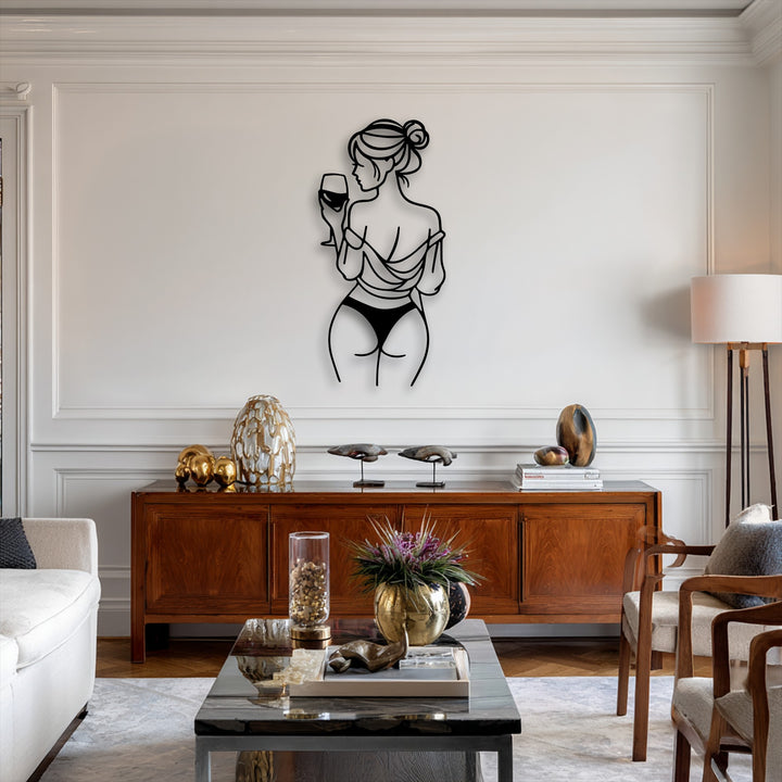 The pristine white wall perfectly highlights the elegant wine moment minimal line art decorative metal art.