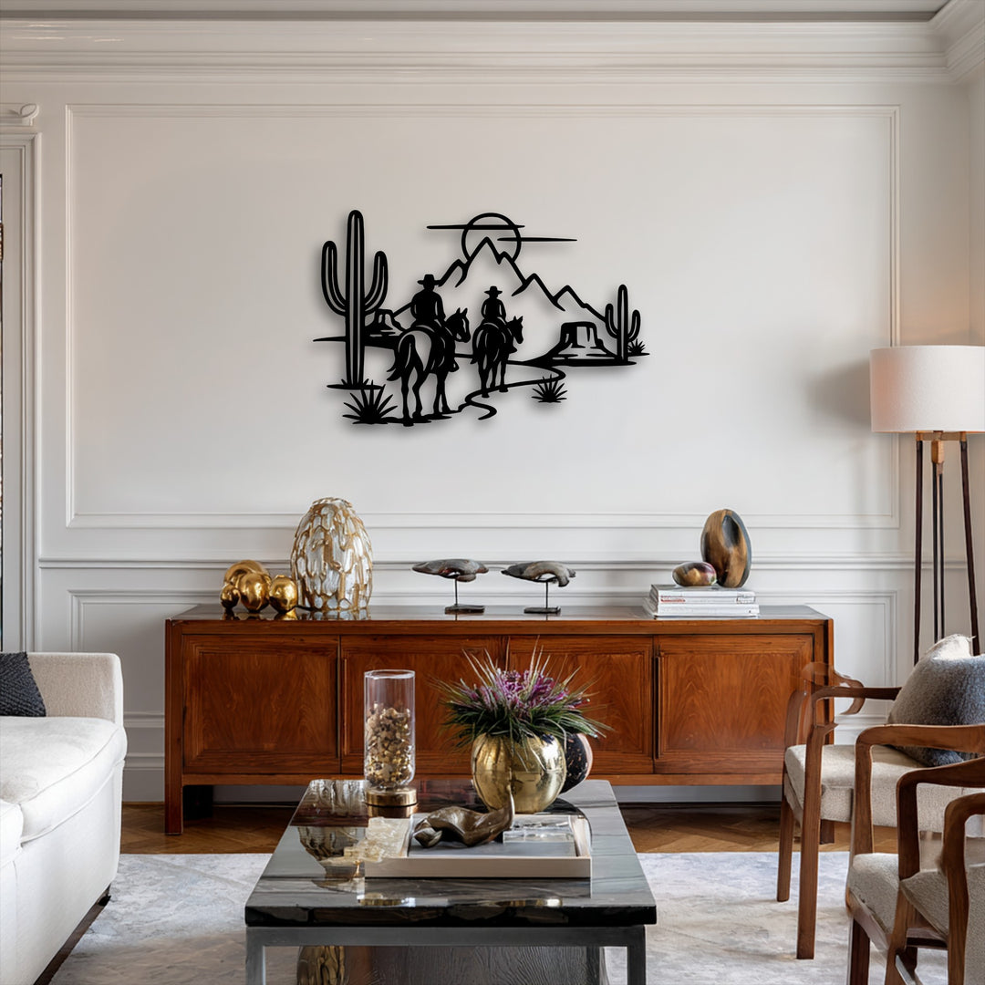 The smooth, matte surface texture of the Western desert cowboys silhouette metal wall decor showcases horseback riders and saguaros.