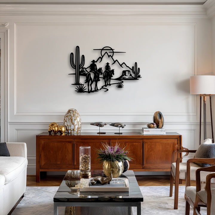 The smooth, matte surface texture of the Western desert cowboys silhouette metal wall decor showcases horseback riders and saguaros.