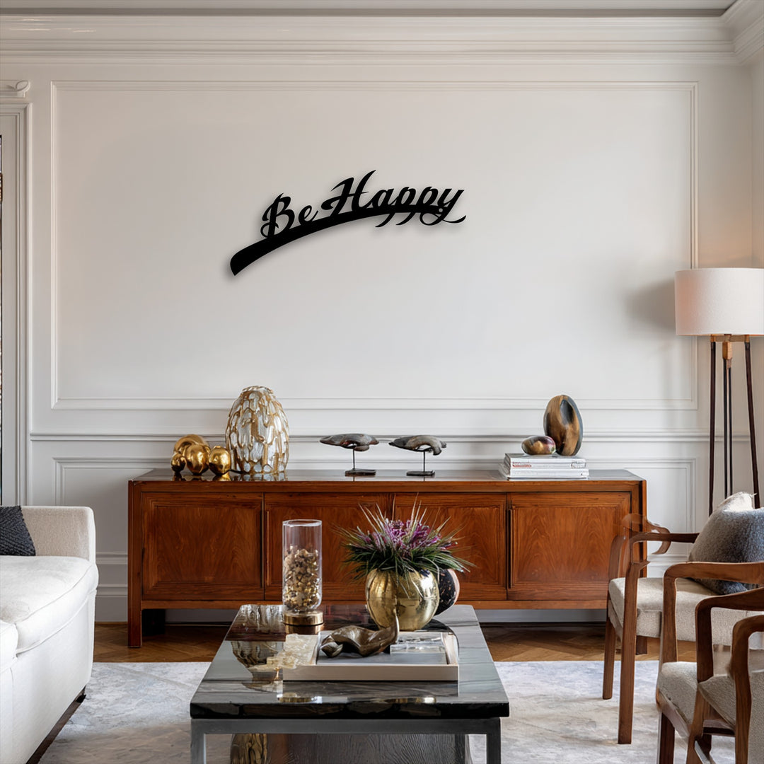 The elegant curves of the Be Happy Script metal wall decor establish a flowing visual rhythm across the tastefully appointed wall.