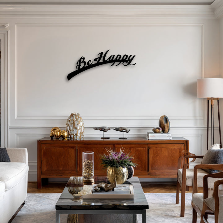 The elegant curves of the Be Happy Script metal wall decor establish a flowing visual rhythm across the tastefully appointed wall.