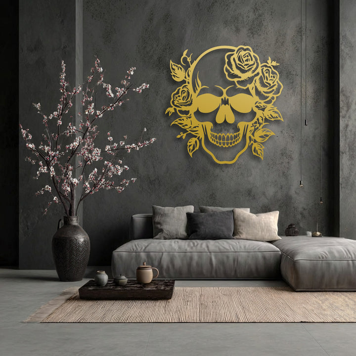 The striking golden floral skull, a bold piece of decorative metal art with roses, serves as the focal point on the textured dark wall.