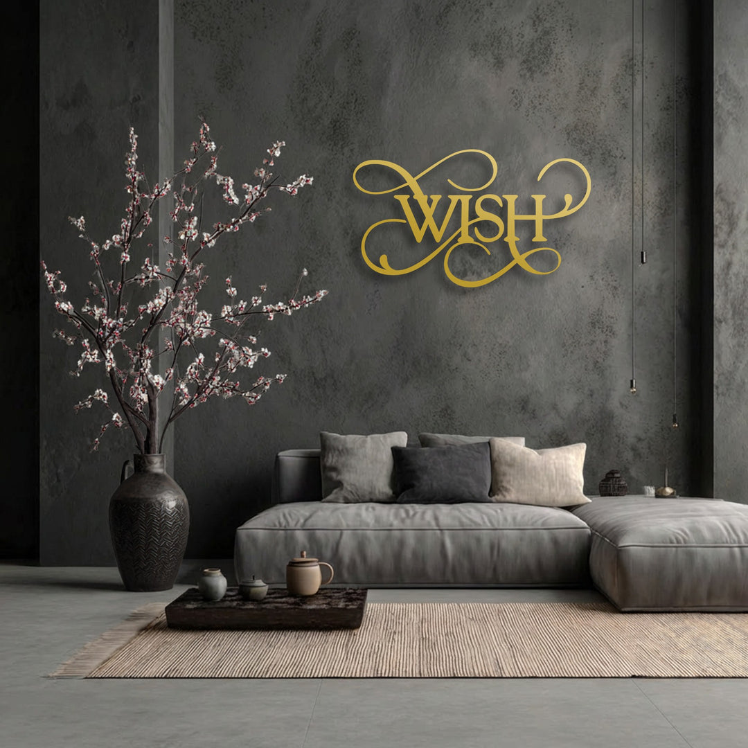 Striking color contrast between the shimmering golden unique metal wall art spelling 'WISH' and the deep, dark charcoal wall backdrop.